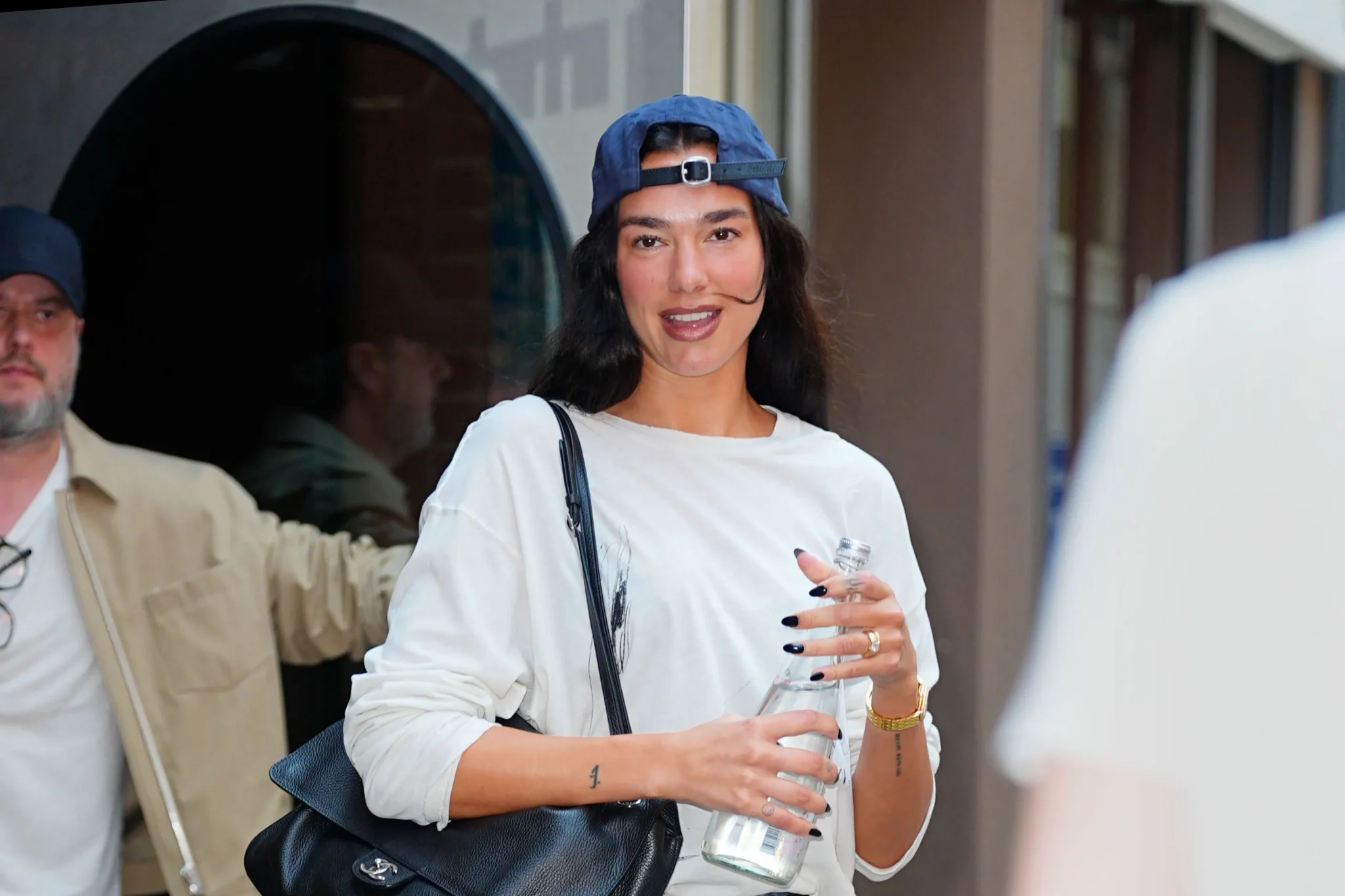 Dua Lipa wearing vacation-inspired studio style in New York City