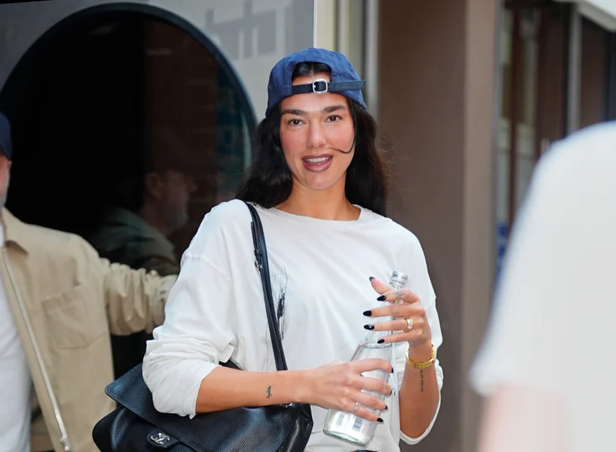 Dua Lipa wearing vacation-inspired studio style in New York City